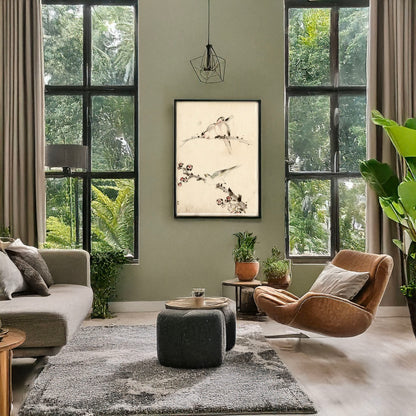 A picture of Three birds perched on branches, one with blossoms, a mockup of the print leaning against a wall