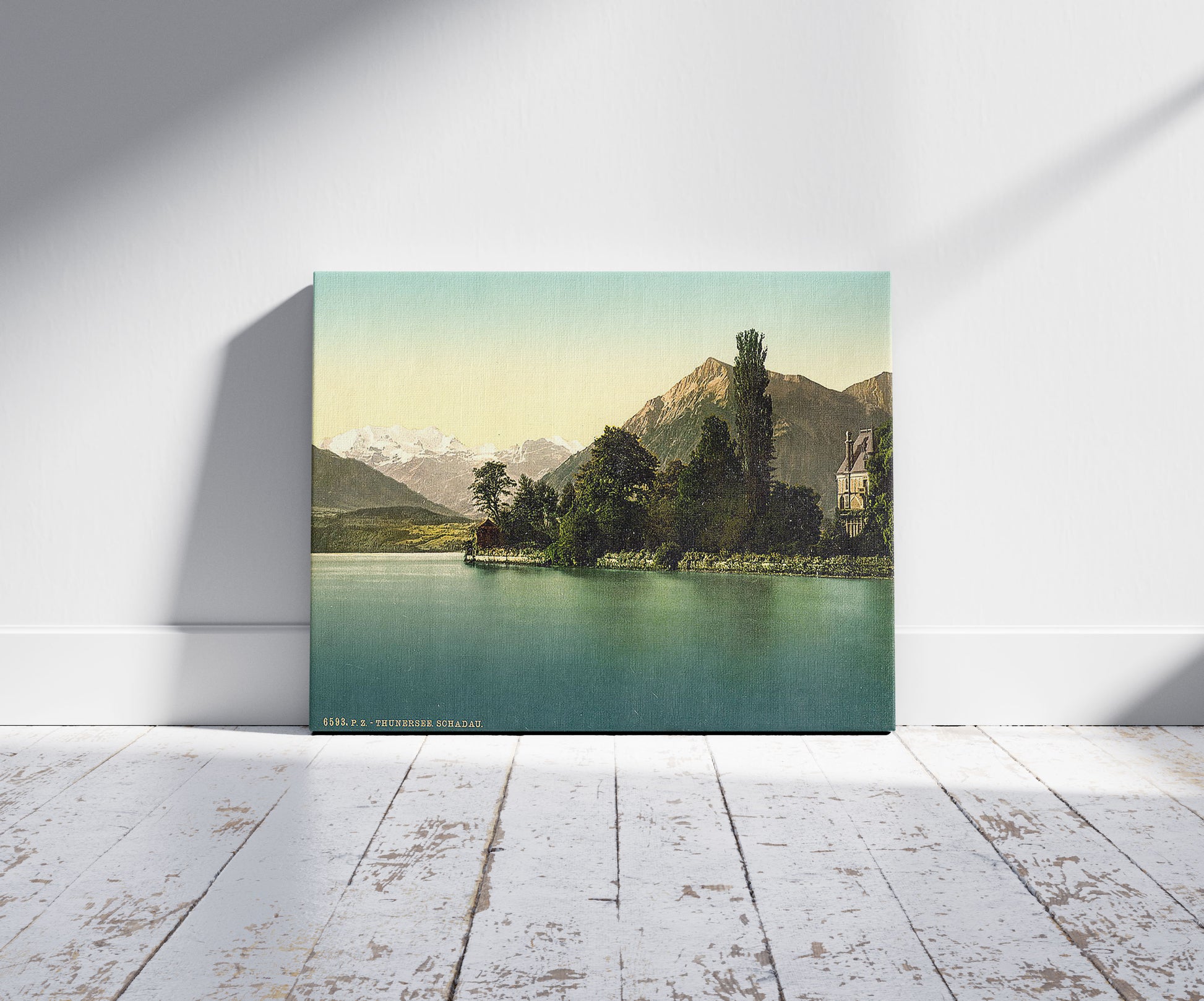 A picture of Thun, Shadau, Bernese Oberland, Switzerland, a mockup of the print leaning against a wall