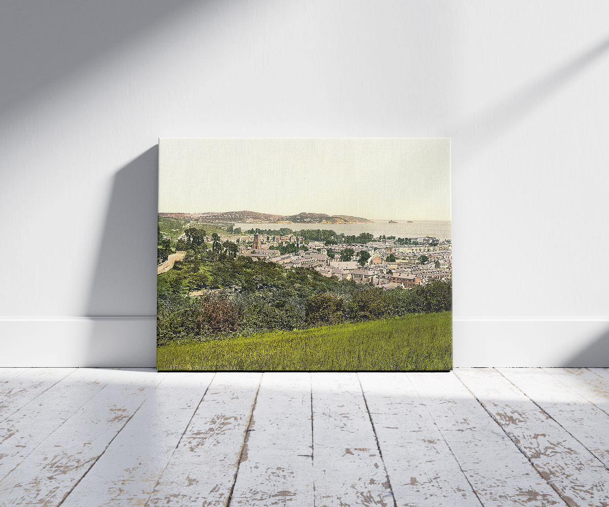 A picture of Torquay and Paignton, England, a mockup of the print leaning against a wall