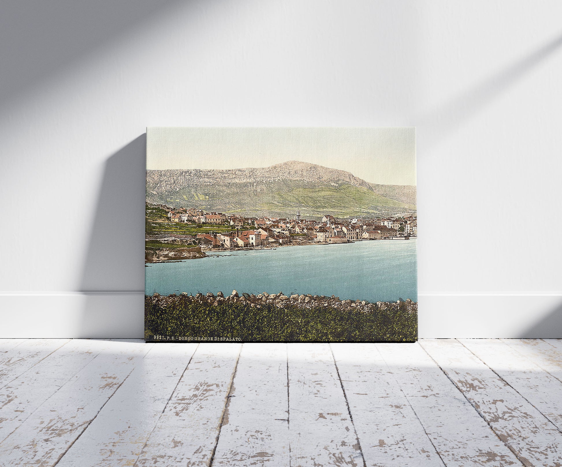 A picture of Traû, general view, Dalmatia, Austro-Hungary, a mockup of the print leaning against a wall