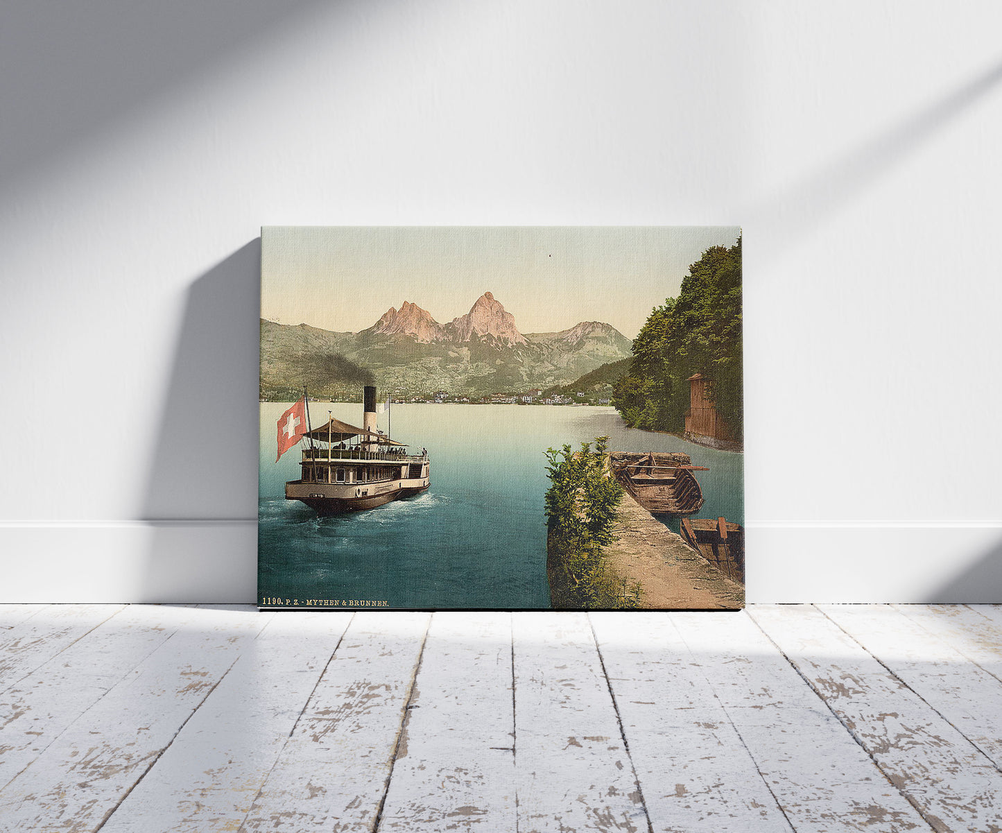 A picture of Treib and Mythen, Lake Lucerne, Switzerland, a mockup of the print leaning against a wall
