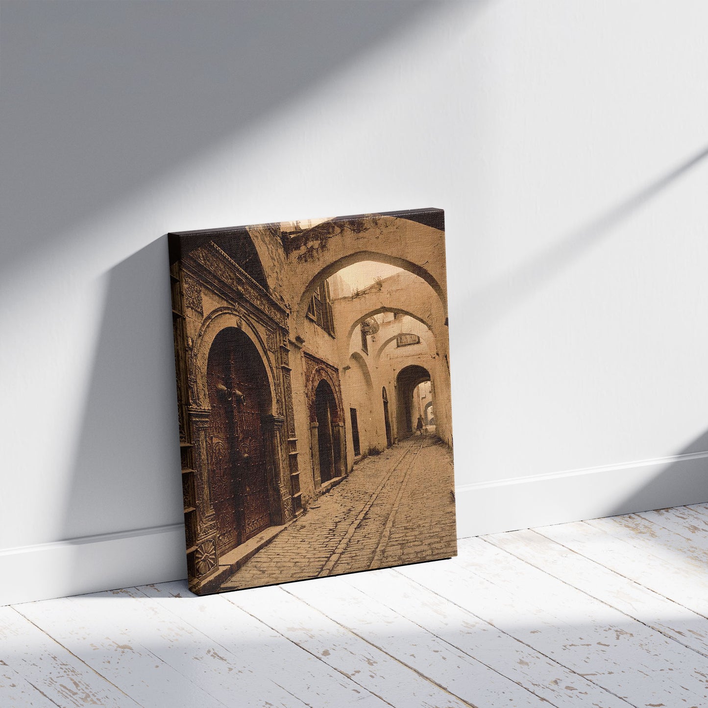 A picture of Tresure Street, Tunis, Tunisia, a mockup of the print leaning against a wall