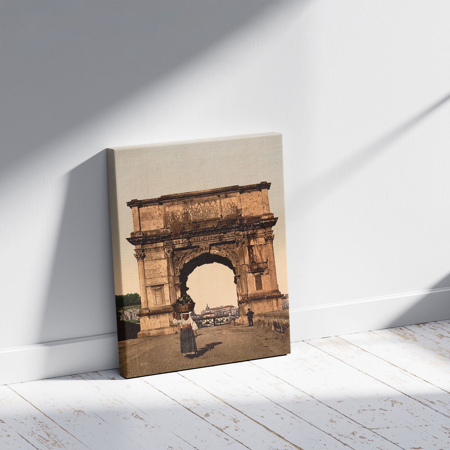 A picture of Triumphal Arch of Titus, Rome, Italy, a mockup of the print leaning against a wall