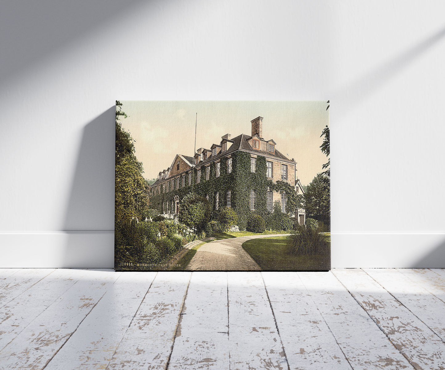 A picture of Troy House, Monmouth, Wales, a mockup of the print leaning against a wall