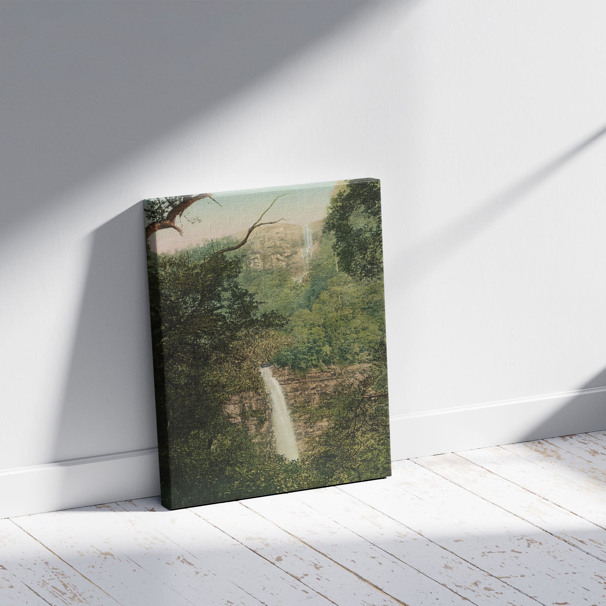 A picture of Twin Falls, Moss Vale, a mockup of the print leaning against a wall