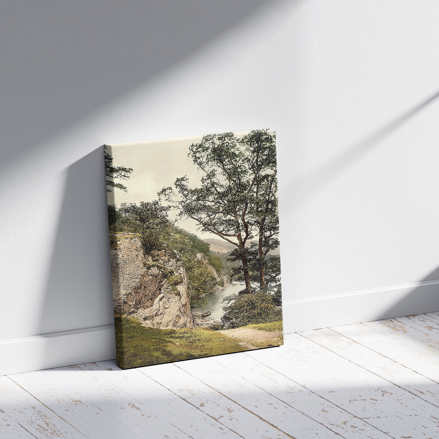 A picture of Ullswater, Stybarrow Crag, Lake District, England, a mockup of the print leaning against a wall