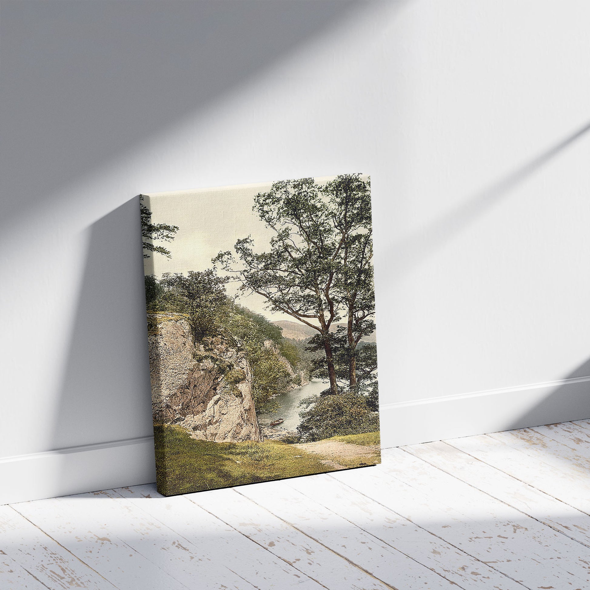 A picture of Ullswater, Stybarrow Crag, Lake District, England, a mockup of the print leaning against a wall