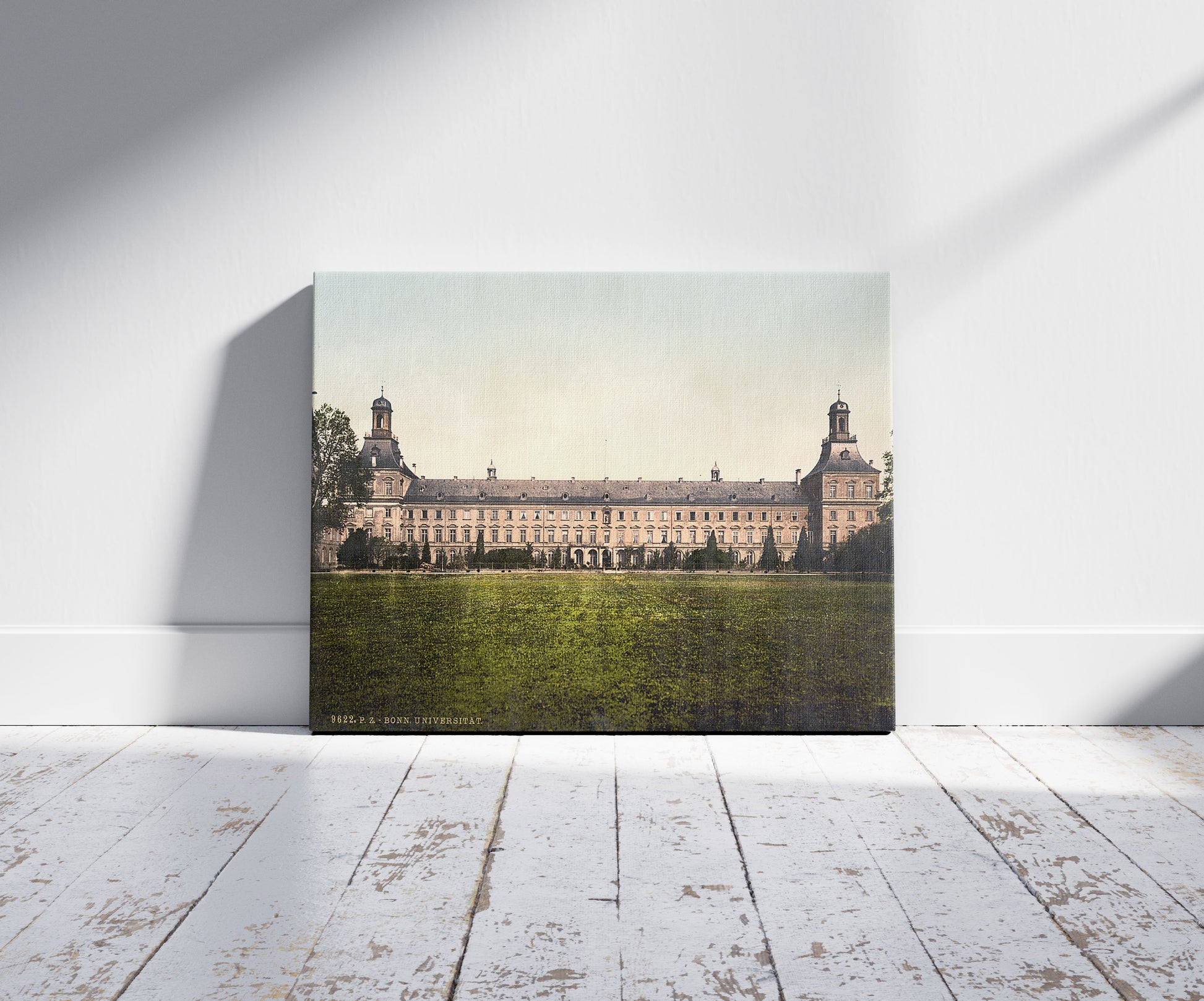 A picture of University, Bonn, the Rhine, Germany, a mockup of the print leaning against a wall