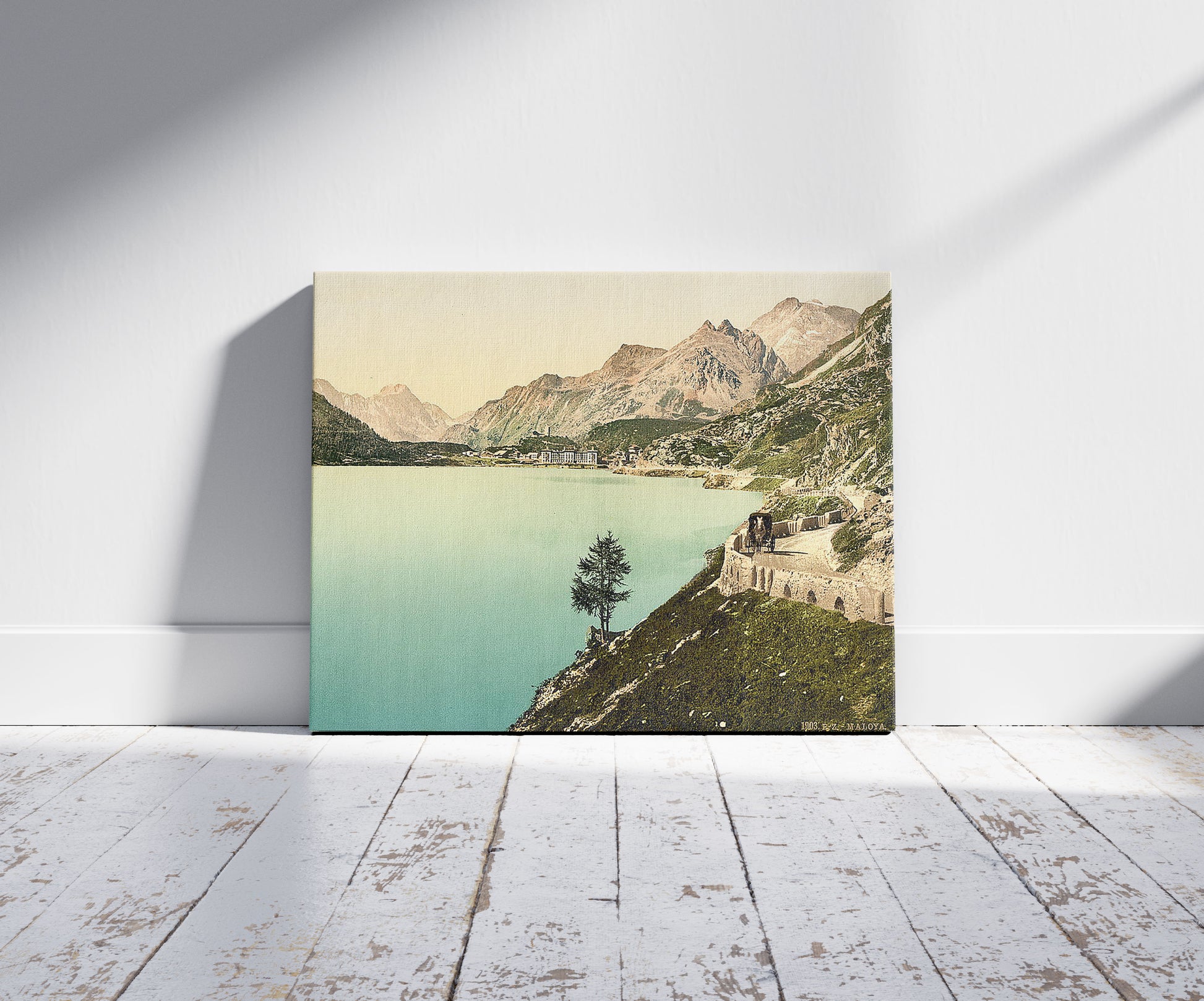 A picture of Upper Engadine, Maloja, Grisons, Switzerland, a mockup of the print leaning against a wall