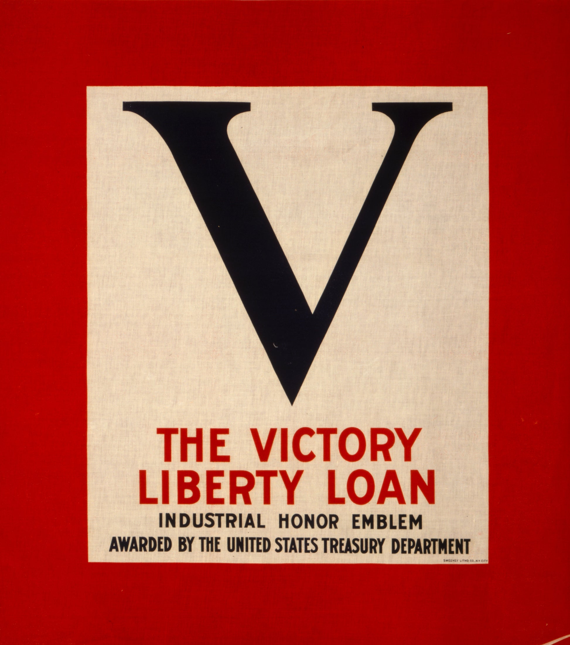 A picture of V--The Victory Liberty Loan industrial honor emblem Awarded by the United States Treasury Department.