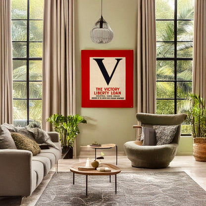 A picture of V--The Victory Liberty Loan industrial honor emblem Awarded by the United States Treasury Department., a mockup of the print leaning against a wall