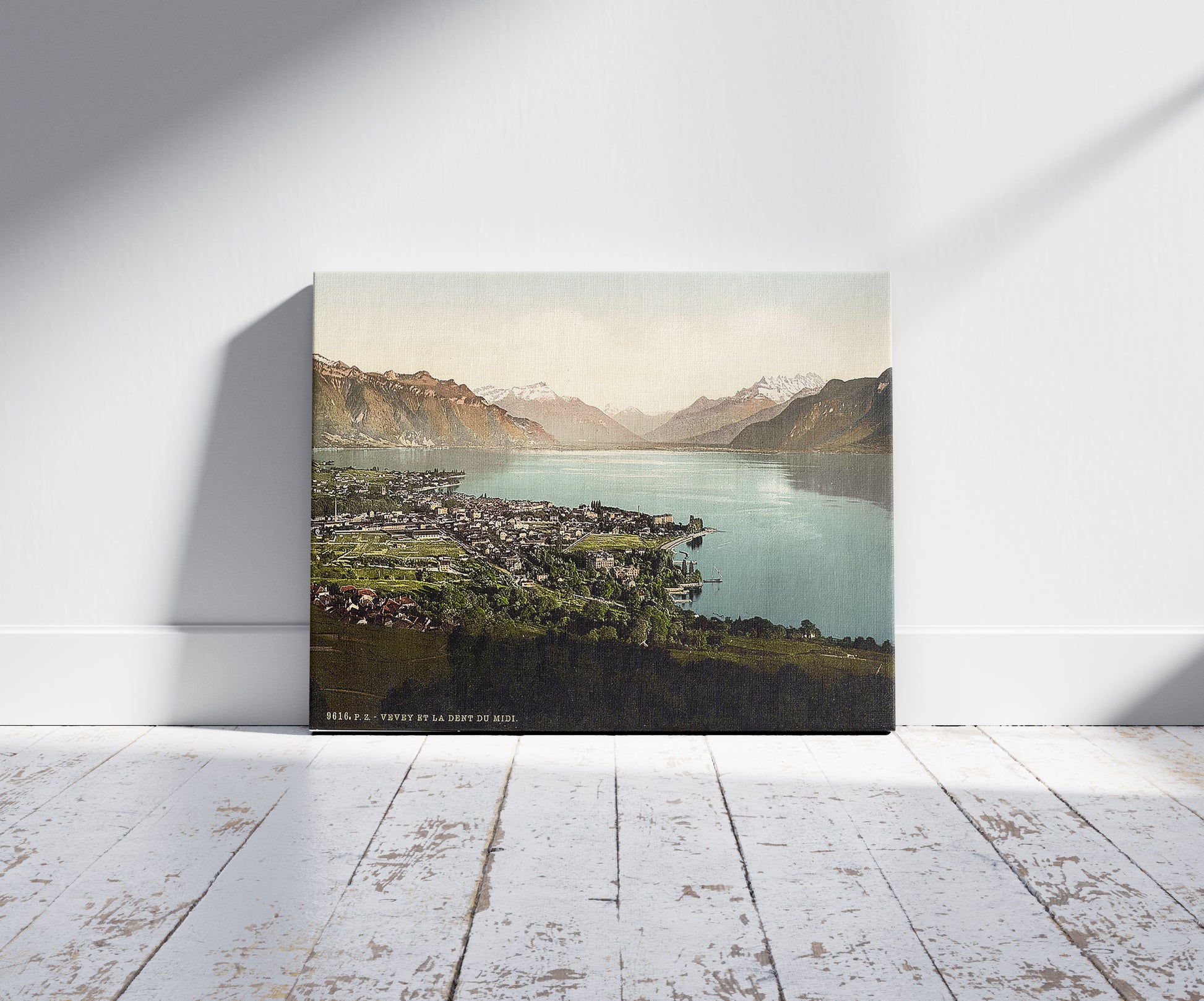 A picture of Vevey, and Dent du Midi, Geneva Lake, Switzerland, a mockup of the print leaning against a wall