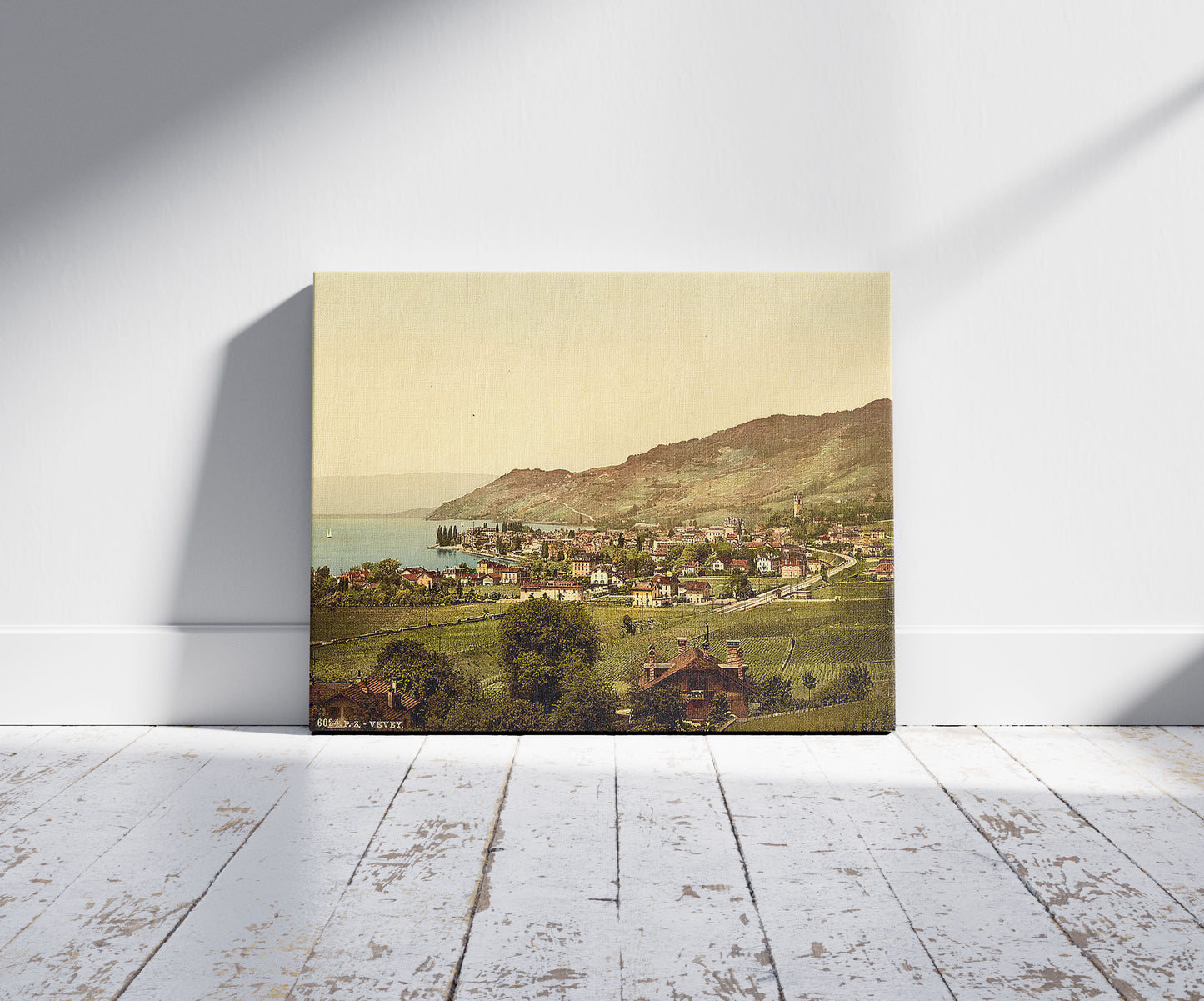 A picture of Vevey, general view, Geneva Lake, Switzerland, a mockup of the print leaning against a wall
