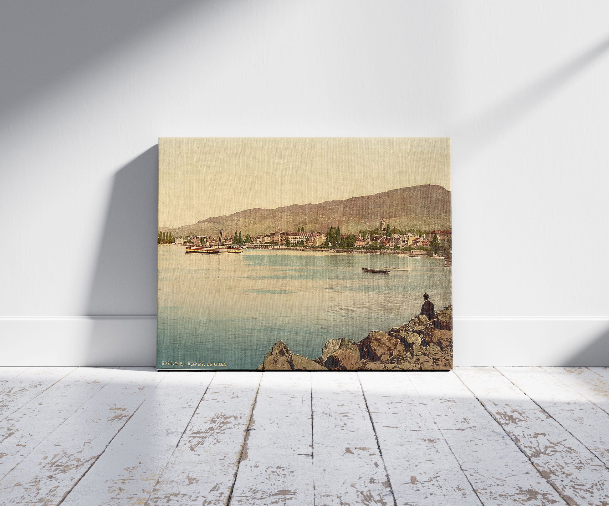 A picture of Vevey, the quay, Geneva Lake, Switzerland, a mockup of the print leaning against a wall