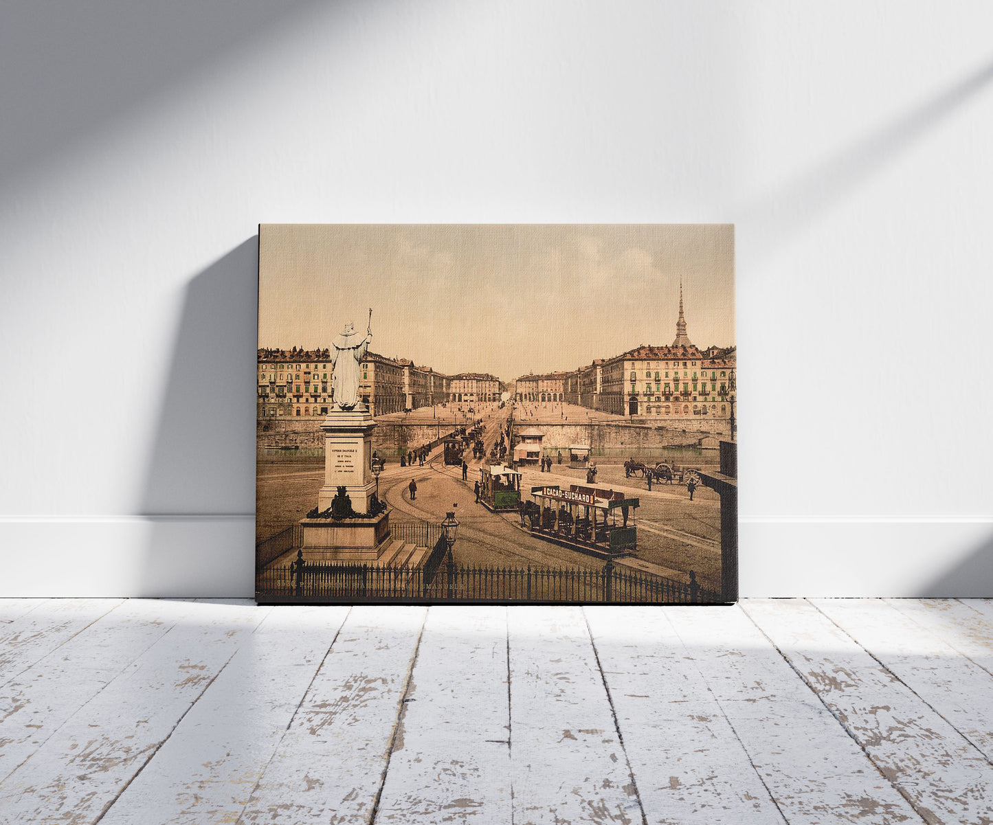 A picture of Victor Emmanuel Place, Turin, Italy, a mockup of the print leaning against a wall