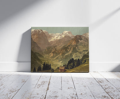 A picture of View of the Alps of Glarus (Selbsanft, Piz Urlu, Todi, etc.), seen from "Rubschen" Braunwald, Glarus, Switzerland, a mockup of the print leaning against a wall