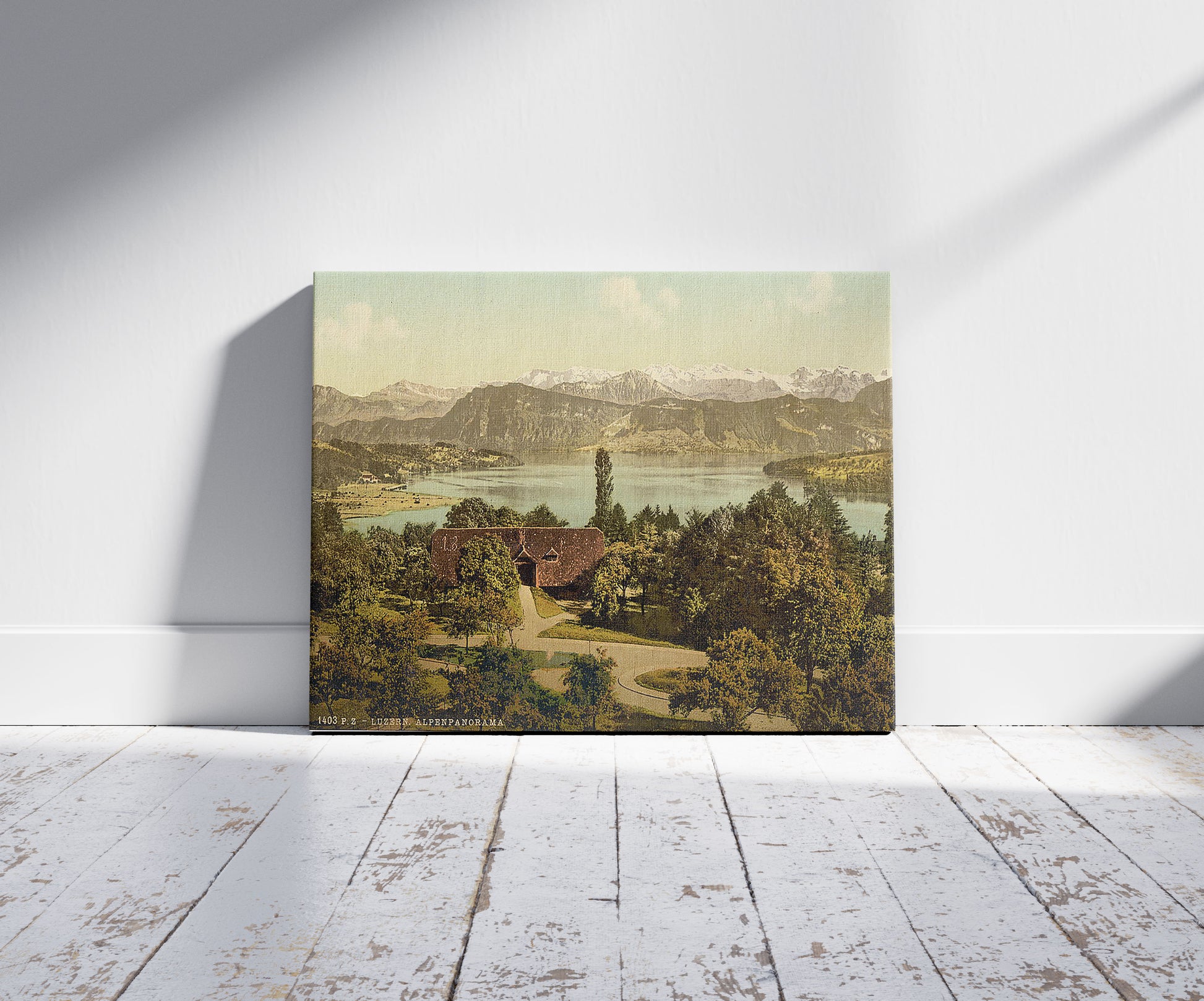 A picture of View of the southern chain of Alps, with the Titlis from Drei Linden, Lucerne, Switzerland, a mockup of the print leaning against a wall