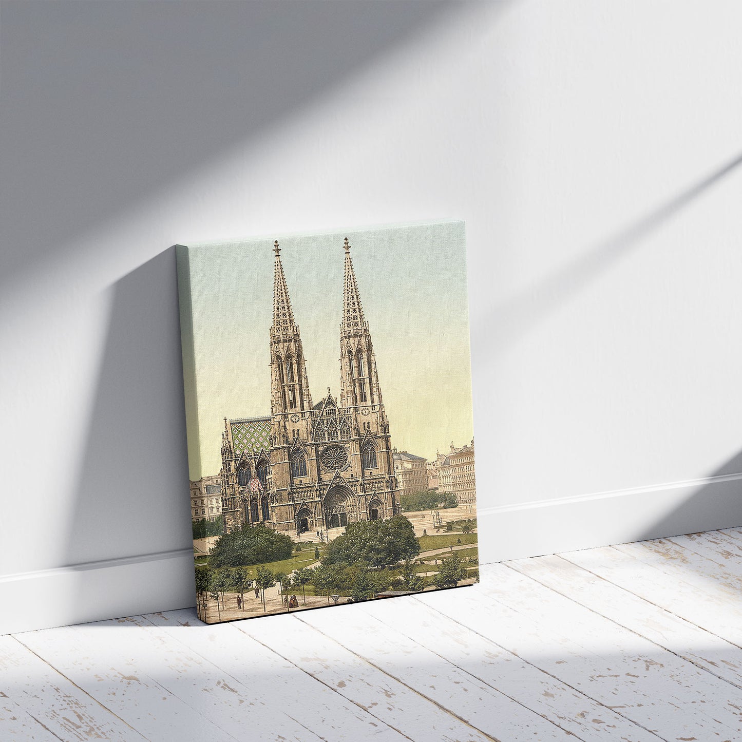 A picture of Votive Church, Vienna, Austro-Hungary, a mockup of the print leaning against a wall