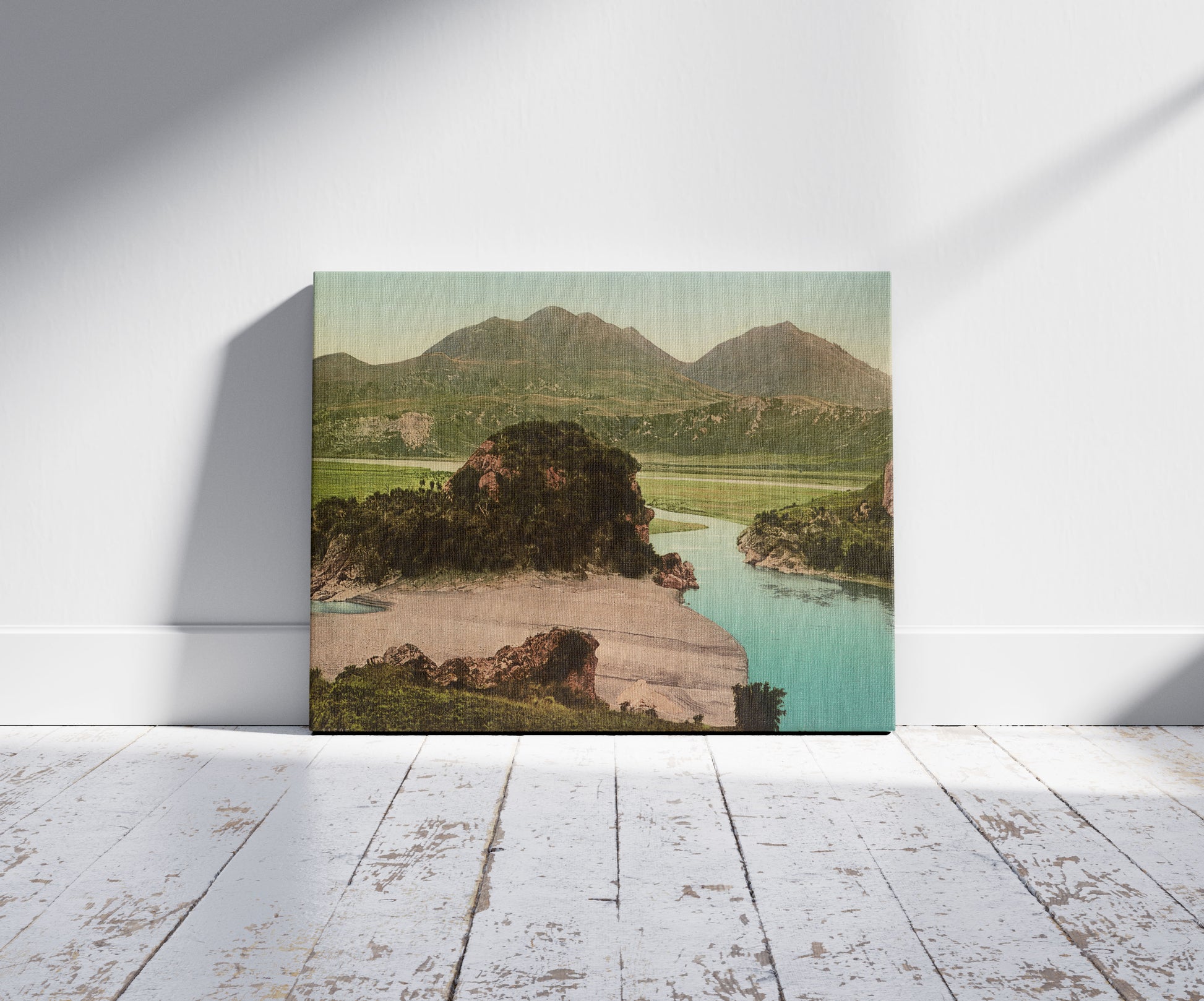 A picture of Waiau River, Canterbury Plains, a mockup of the print leaning against a wall