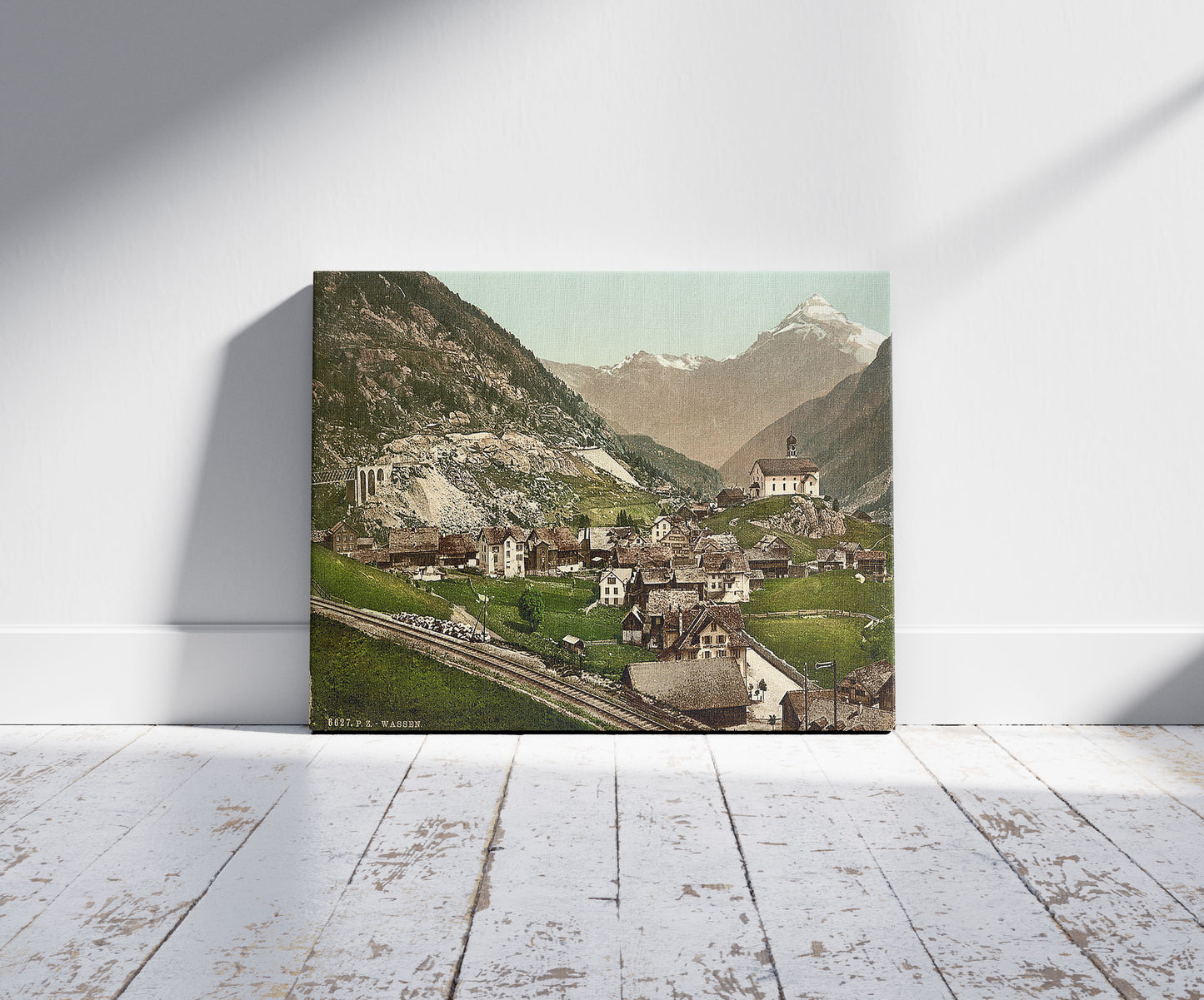 A picture of Wassen, and Middle Maienreuss Bridge, St. Gotthard, Switzerland, a mockup of the print leaning against a wall