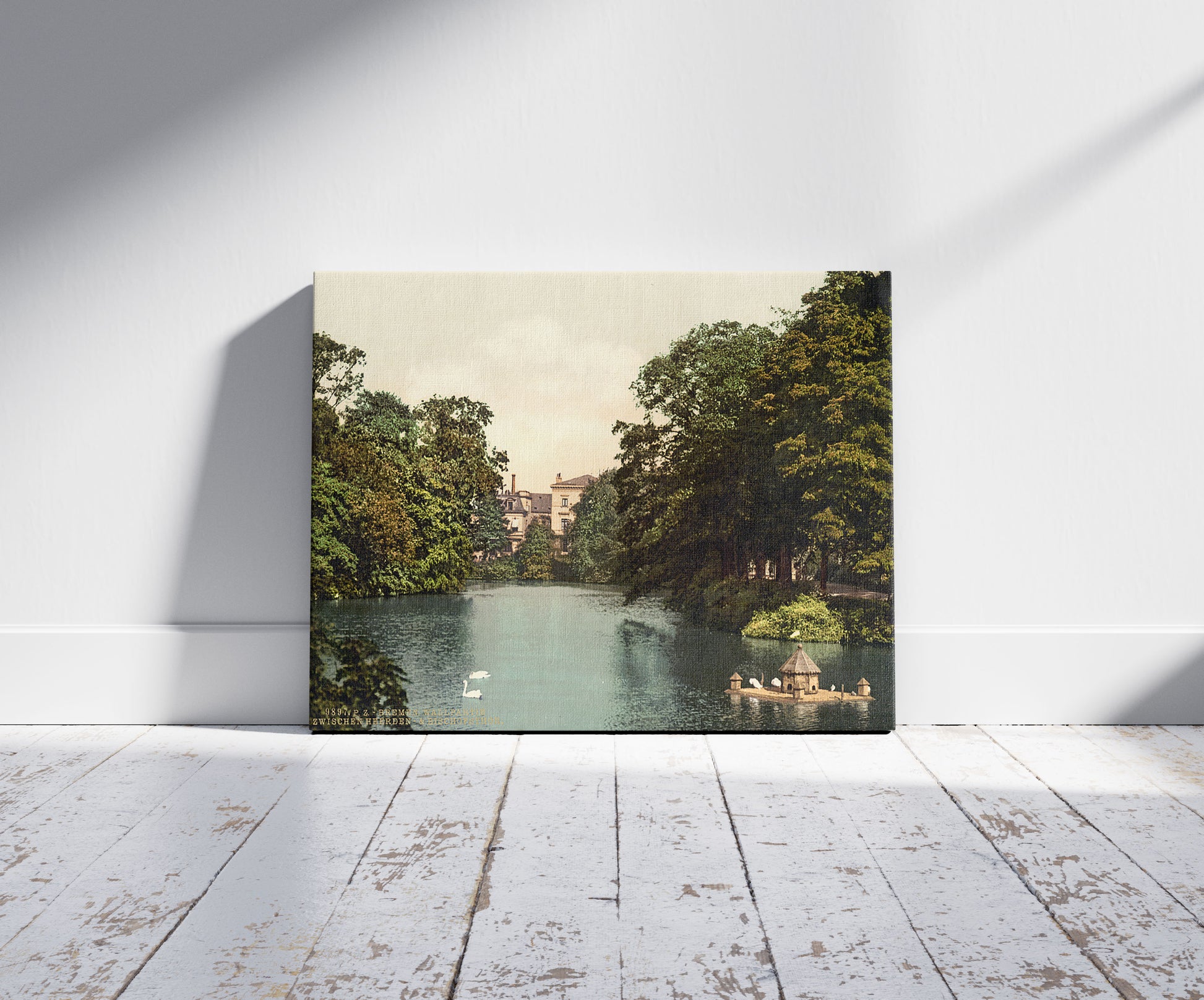 A picture of Water scene between Heedenthor and Bischofsthor, Bremen, Germany, a mockup of the print leaning against a wall