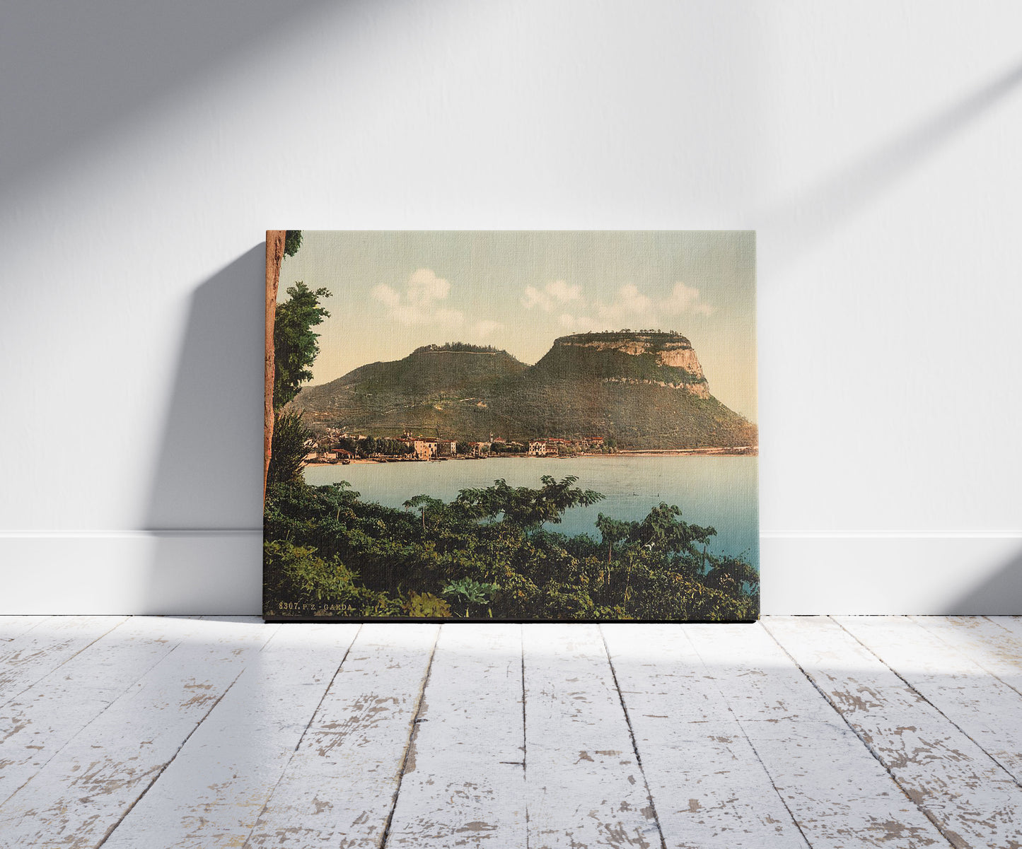 A picture of Waterfront, Lake Garda, Italy, a mockup of the print leaning against a wall