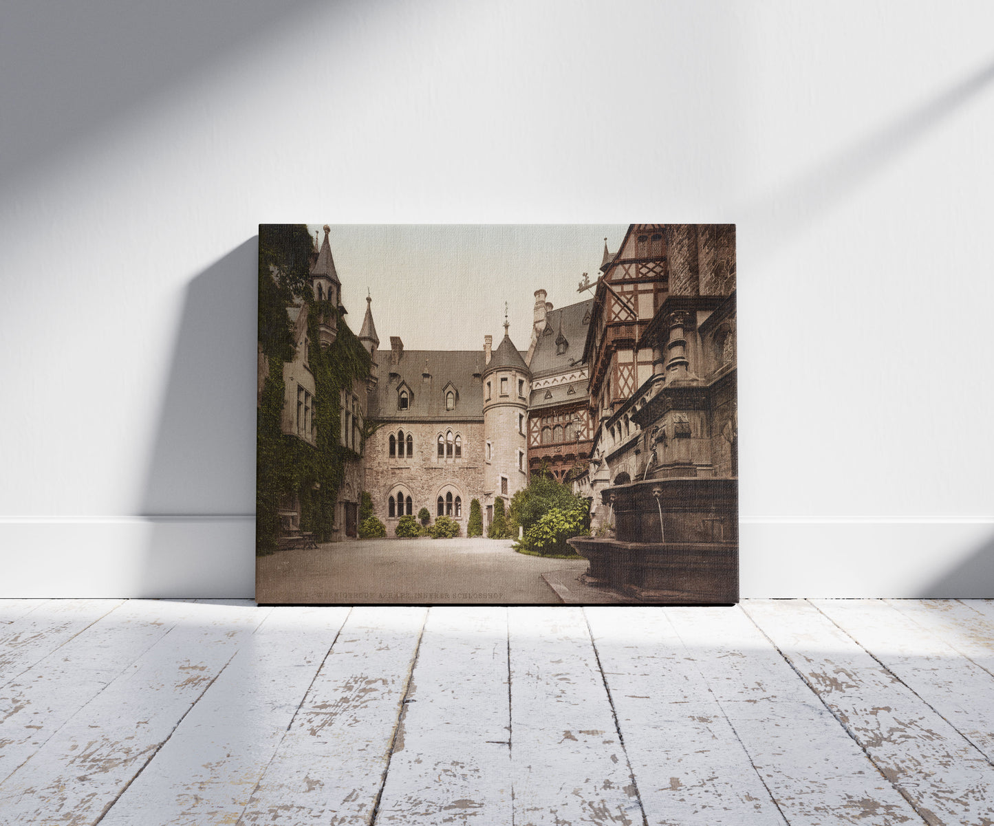 A picture of Wernigerode a/Harz. Innerer Schlosshof, a mockup of the print leaning against a wall