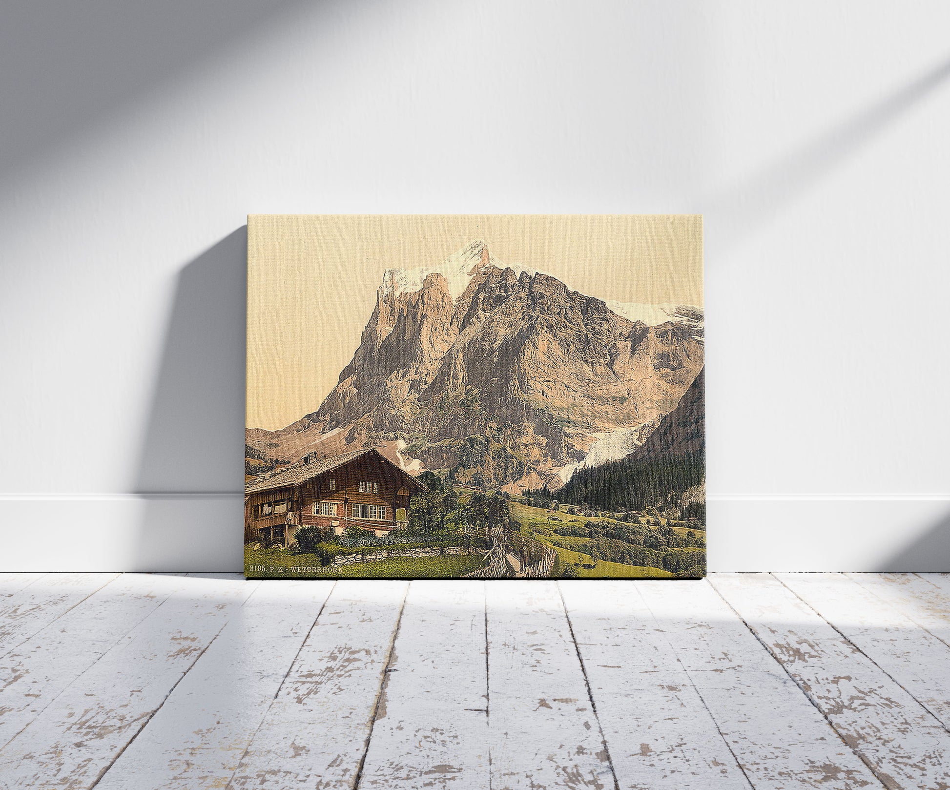 A picture of Wetterhorn, from the Scheideg, Bernese Oberland, Switzerland, a mockup of the print leaning against a wall