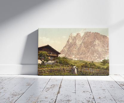 A picture of Wetterhorn Mountain and chalet, Bernese Oberland, Switzerland, a mockup of the print leaning against a wall