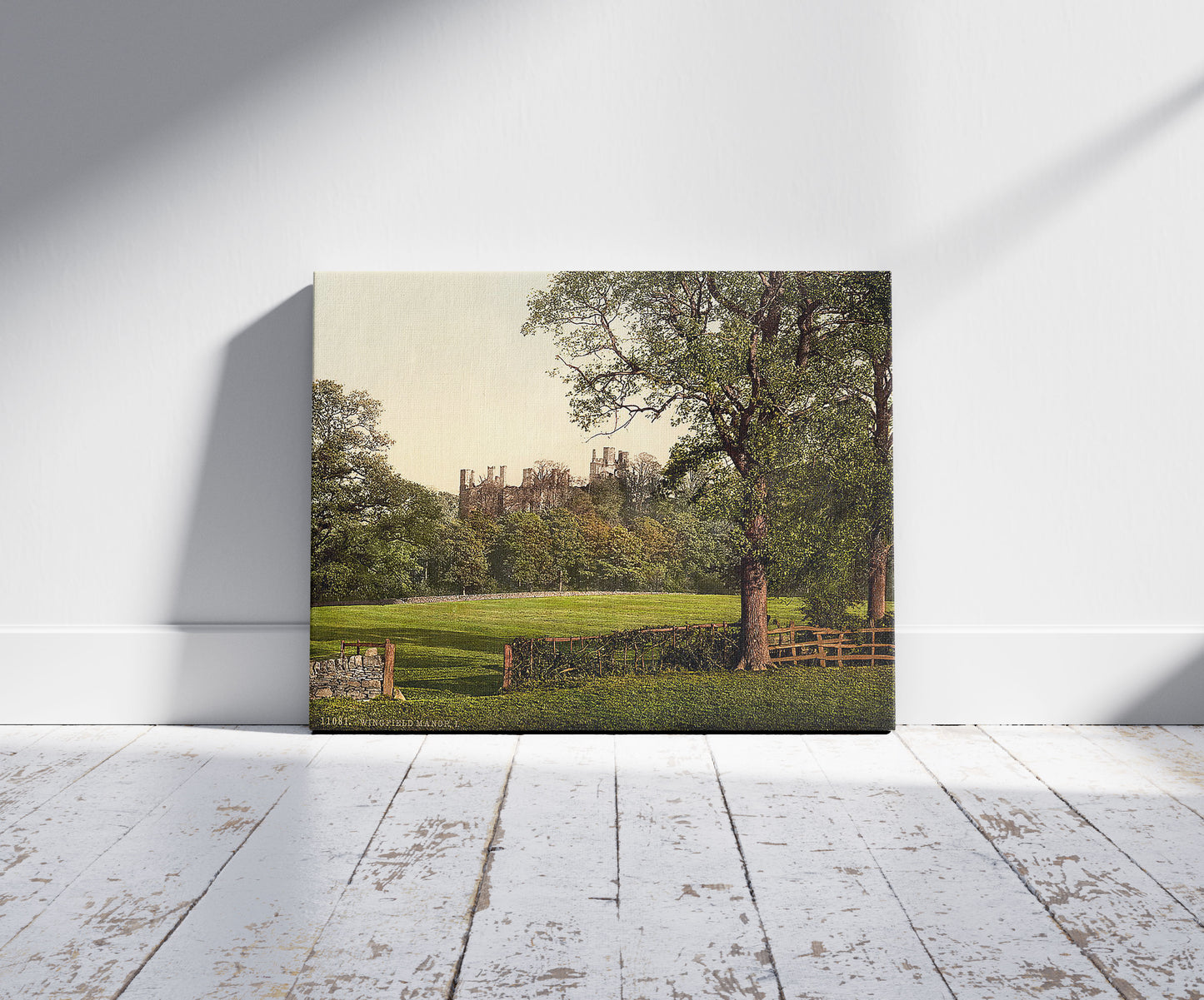 A picture of Wingfield Manor, I., Derbyshire, England, a mockup of the print leaning against a wall