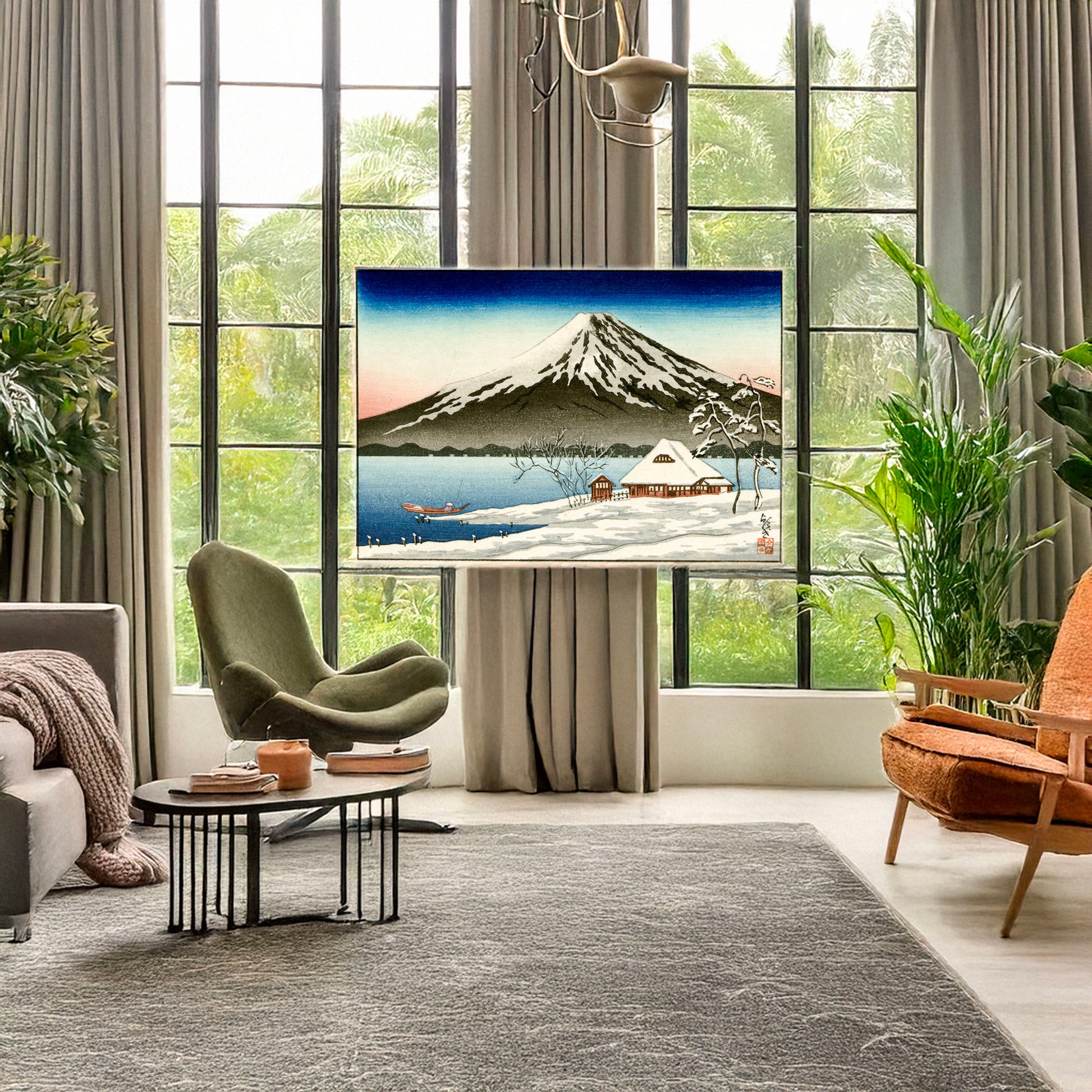 A picture of Winter landscape with small snow-covered building on the coast and view of Mount Fuji, a mockup of the print leaning against a wall