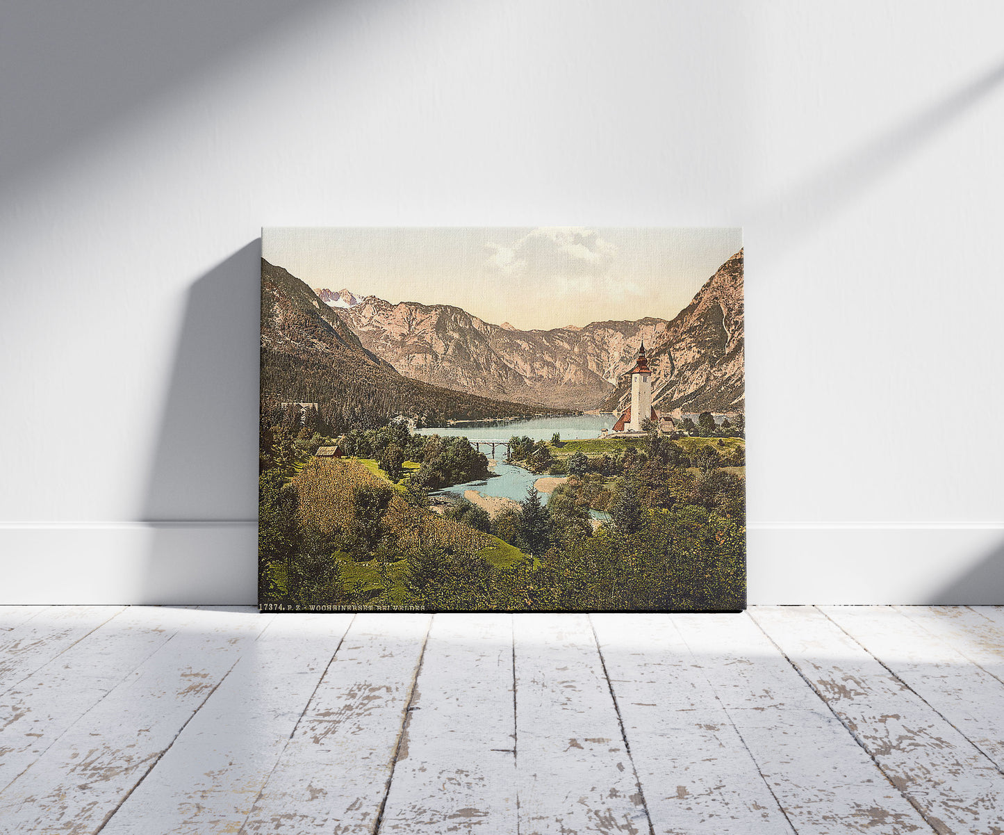 A picture of Wocheiner Lake, Carniola, Austro-Hungary, a mockup of the print leaning against a wall