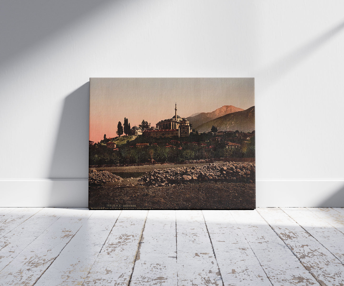 A picture of Yıldırım Beyazıt mosque, Bursa, Turkey, a mockup of the print leaning against a wall