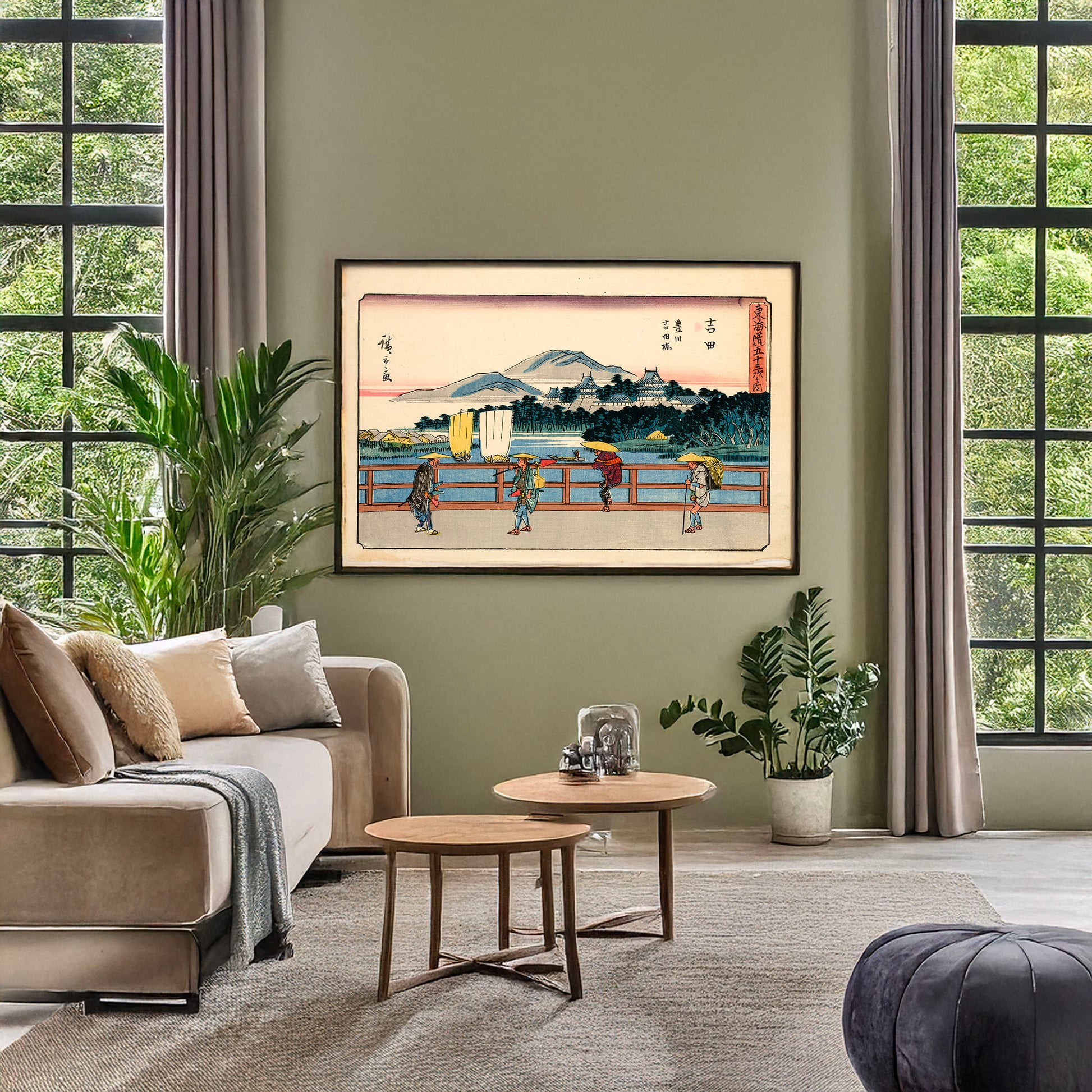 A picture of Yoshida, a mockup of the print leaning against a wall
