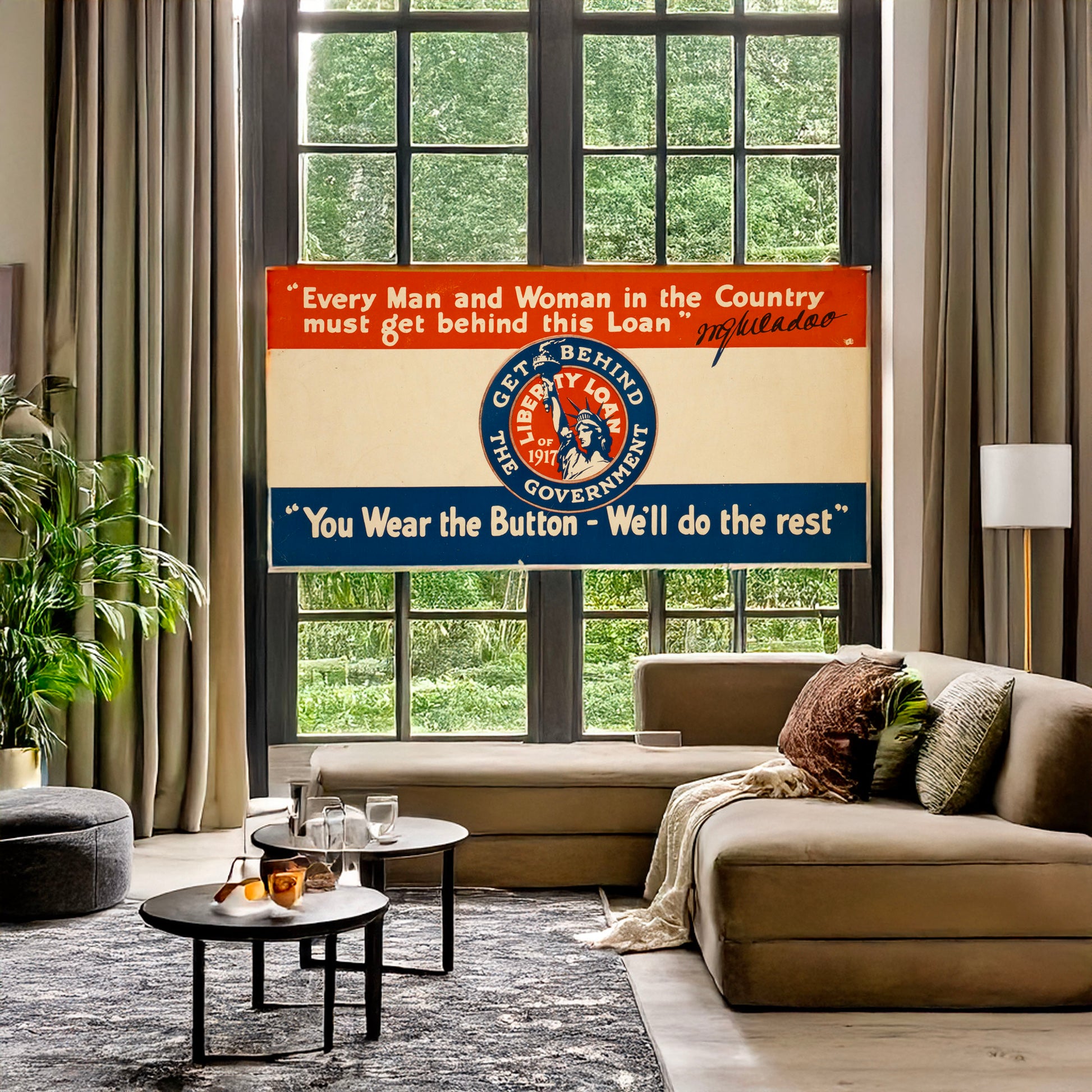 A picture of "You wear the button - we'll do the rest" "Every man and woman in the country must get behind this loan" W.G. McAdoo., a mockup of the print leaning against a wall