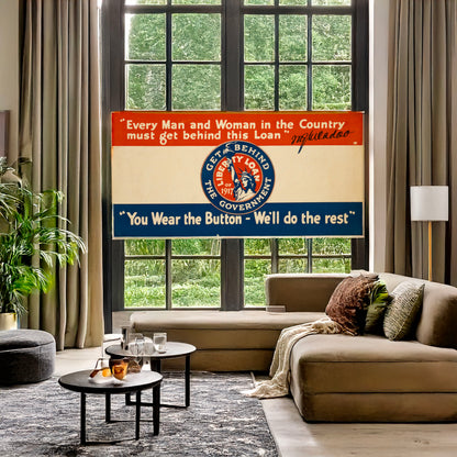 A picture of "You wear the button - we'll do the rest" "Every man and woman in the country must get behind this loan" W.G. McAdoo., a mockup of the print leaning against a wall