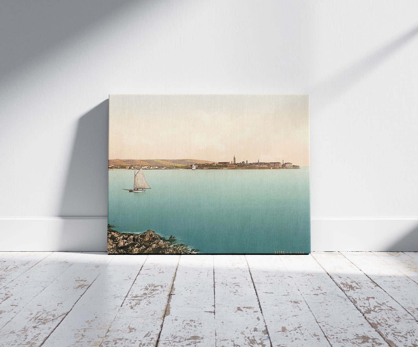 A picture of Zara, from the sea, Dalmatia, Austro-Hungary, a mockup of the print leaning against a wall