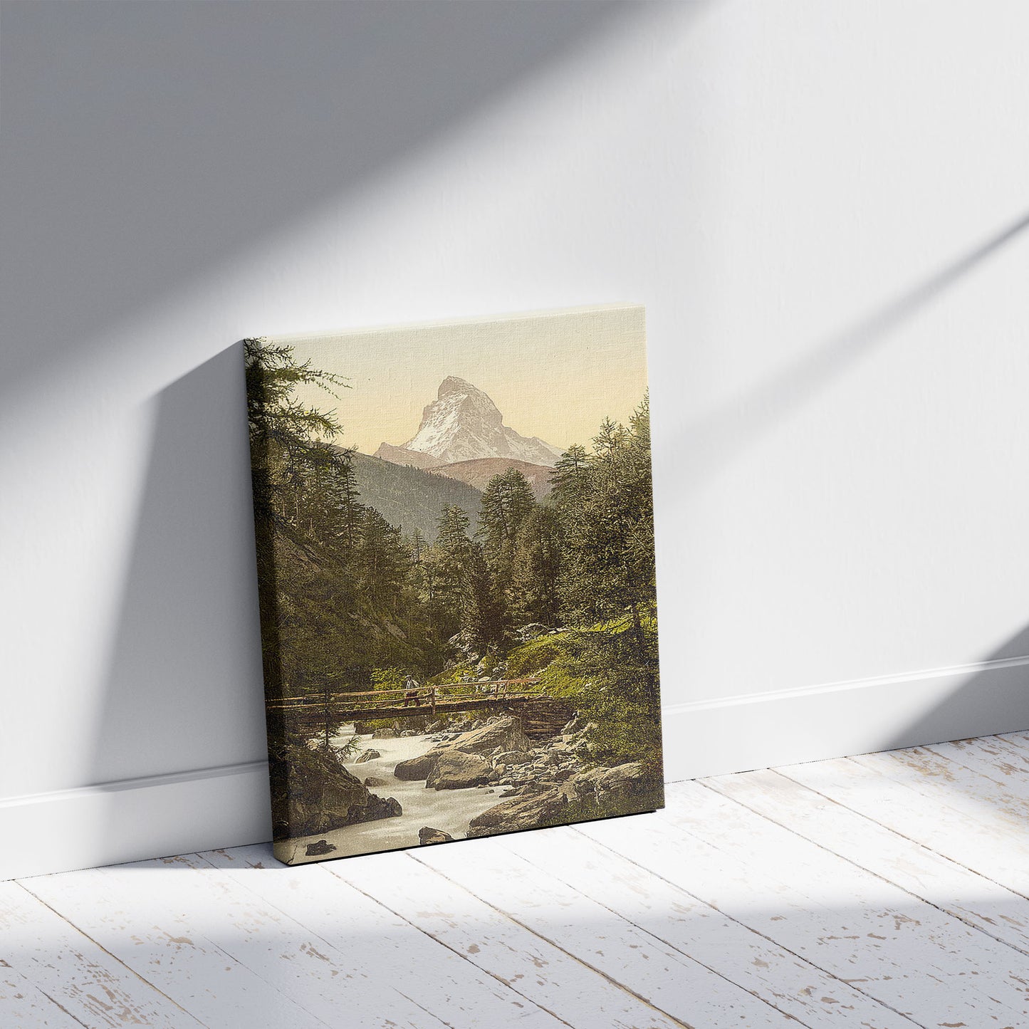 A picture of Zermatt, Vispach Bridge, with top of Matterhorn, Valais, Alps of, Switzerland, a mockup of the print leaning against a wall