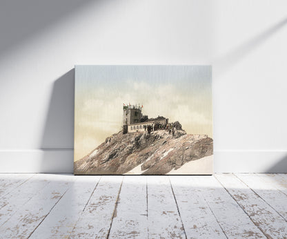 A picture of Zugspitze with signal station, Upper Bavaria, Germany, a mockup of the print leaning against a wall