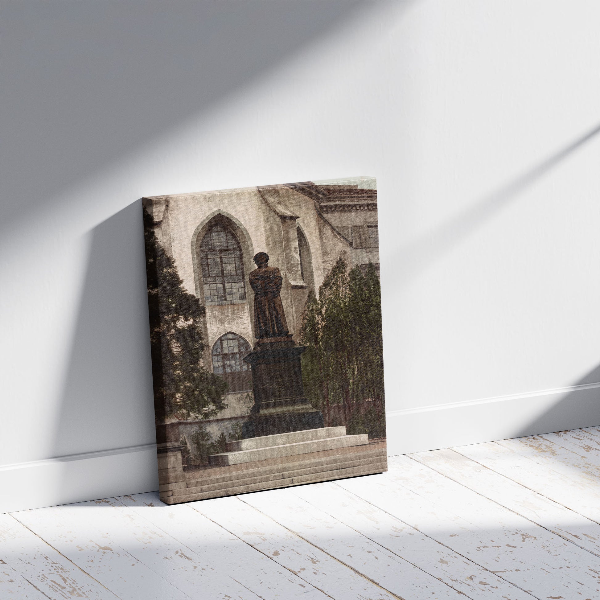 A picture of Zurich. Ulrichzwingli Denkmal, a mockup of the print leaning against a wall