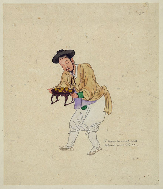 A picture of A man servant with usual meal table
