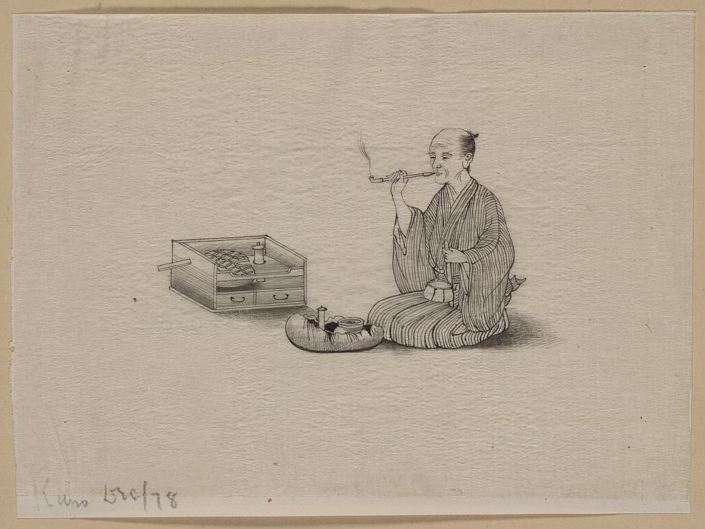 A picture of An elderly man, seated, smoking