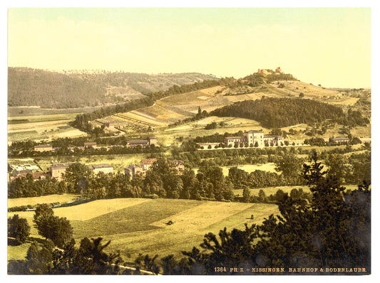 A picture of Bad Kissengen (i.e. Bad Kissingen) railway station and the Bodenlaube, seen from the Altenberg, Bavaria, Germany