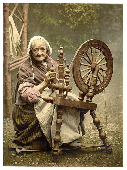 A picture of Irish spinner and spinning wheel. County Galway, Ireland