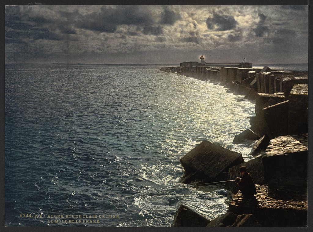 A picture of Moonlight view, with lighthouse, Algiers, Algeria