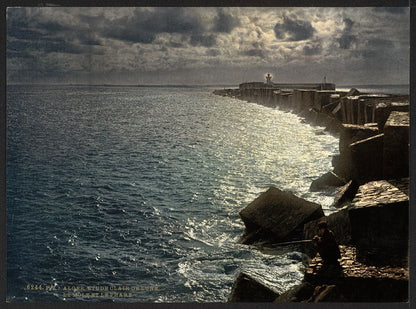 A picture of Moonlight view, with lighthouse, Algiers, Algeria