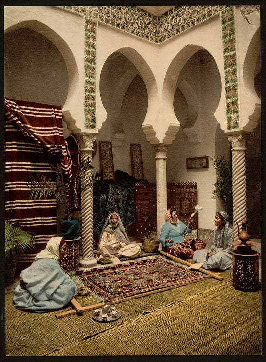 A picture of Moorish women making Arab carpets, Algiers, Algeria