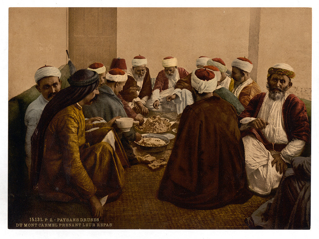 A picture of Peasant Druses, (i.e., Druzes) of Mount Carmel taking a meal, Holy Land, (i.e., Israel)