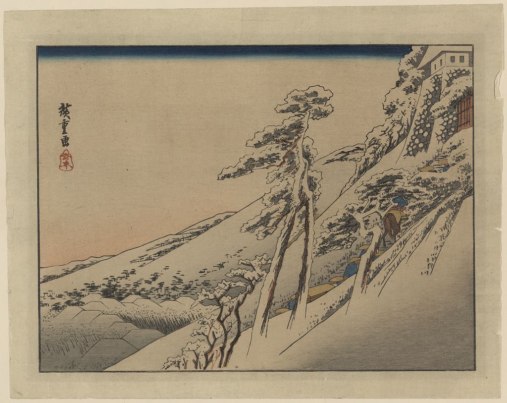 A picture of Pilgrims ascending snow-covered hillside toward temple at summit