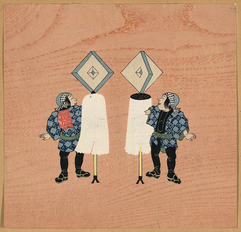 A picture of Two firemen holding the standards of their companies